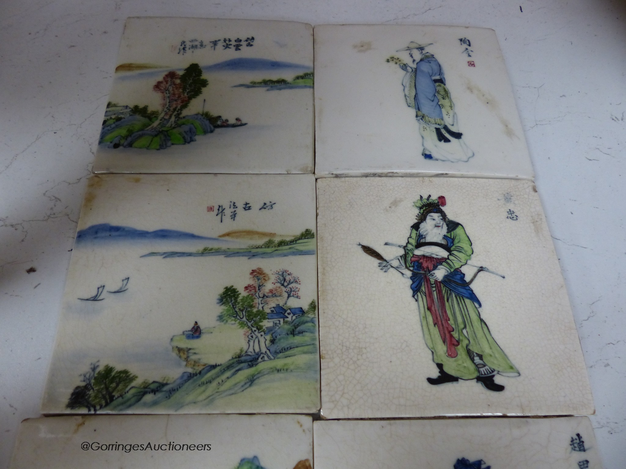 Four Chinese landscape tiles and four Chinese figurative tiles, 13cm square